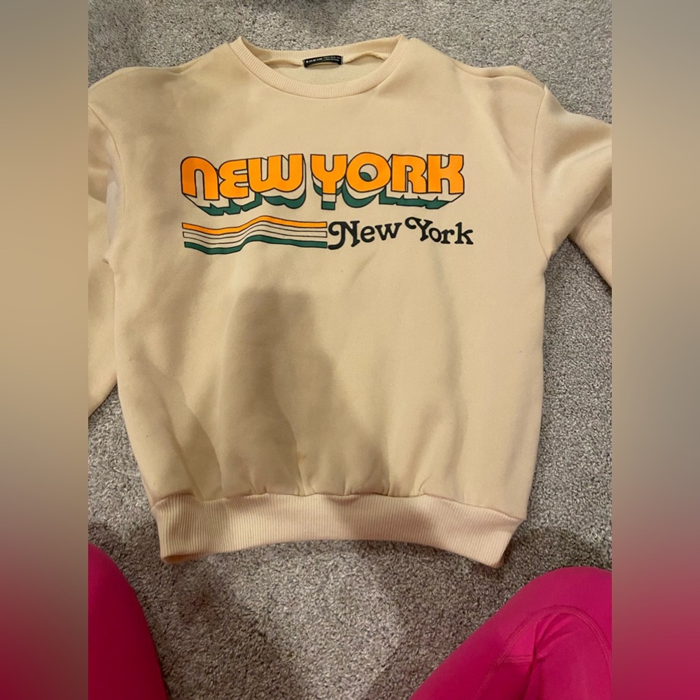 This is a cute sweatshirt super comfy and trendy